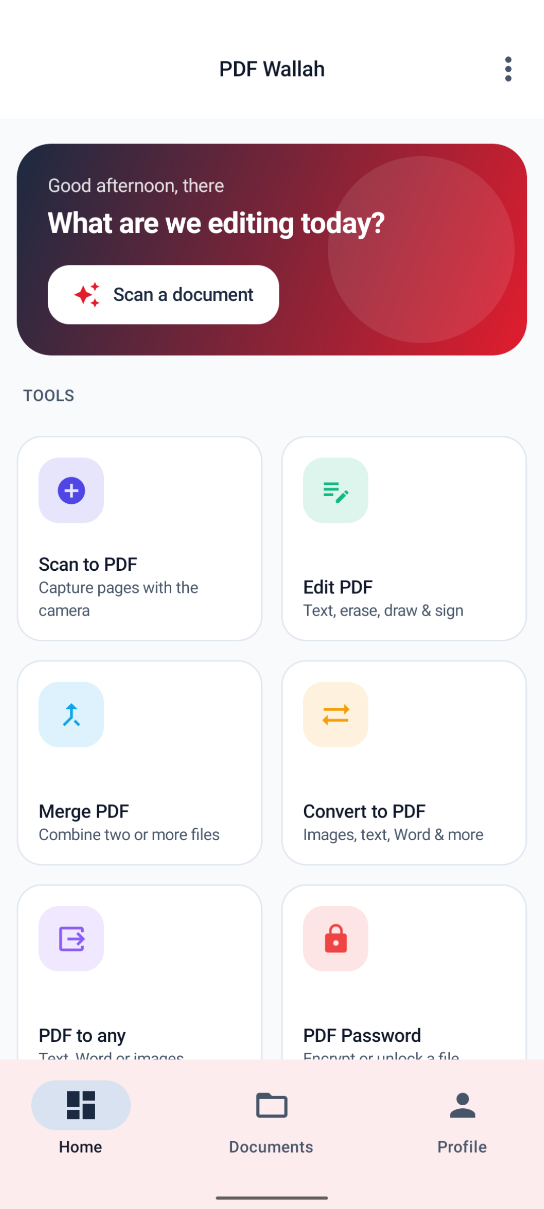 The home screen in light mode: the same red gradient greeting card and tools grid, this time on a white background with dark text.